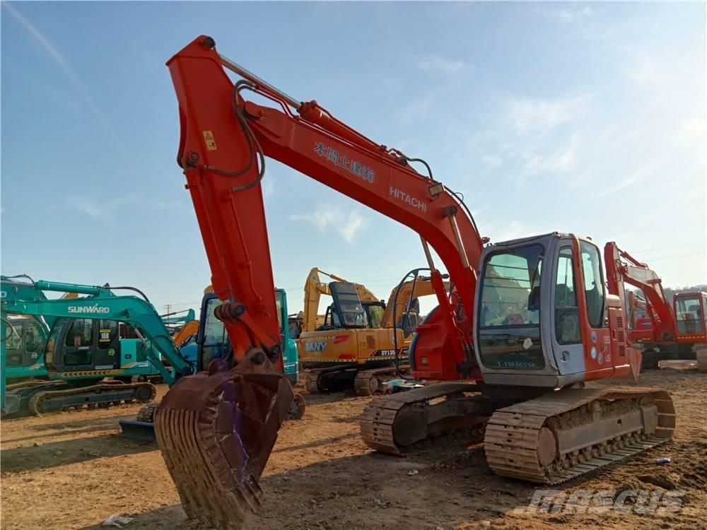 Hitachi ZX135US Гусеничні екскаватори