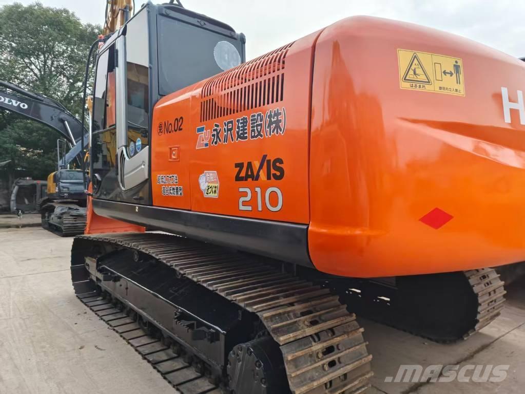 Hitachi ZX 210 Гусеничні екскаватори