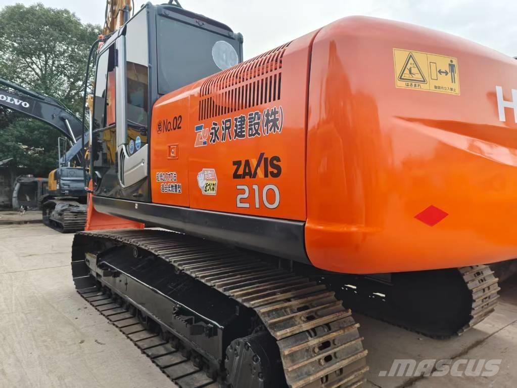 Hitachi ZX 210 Гусеничні екскаватори