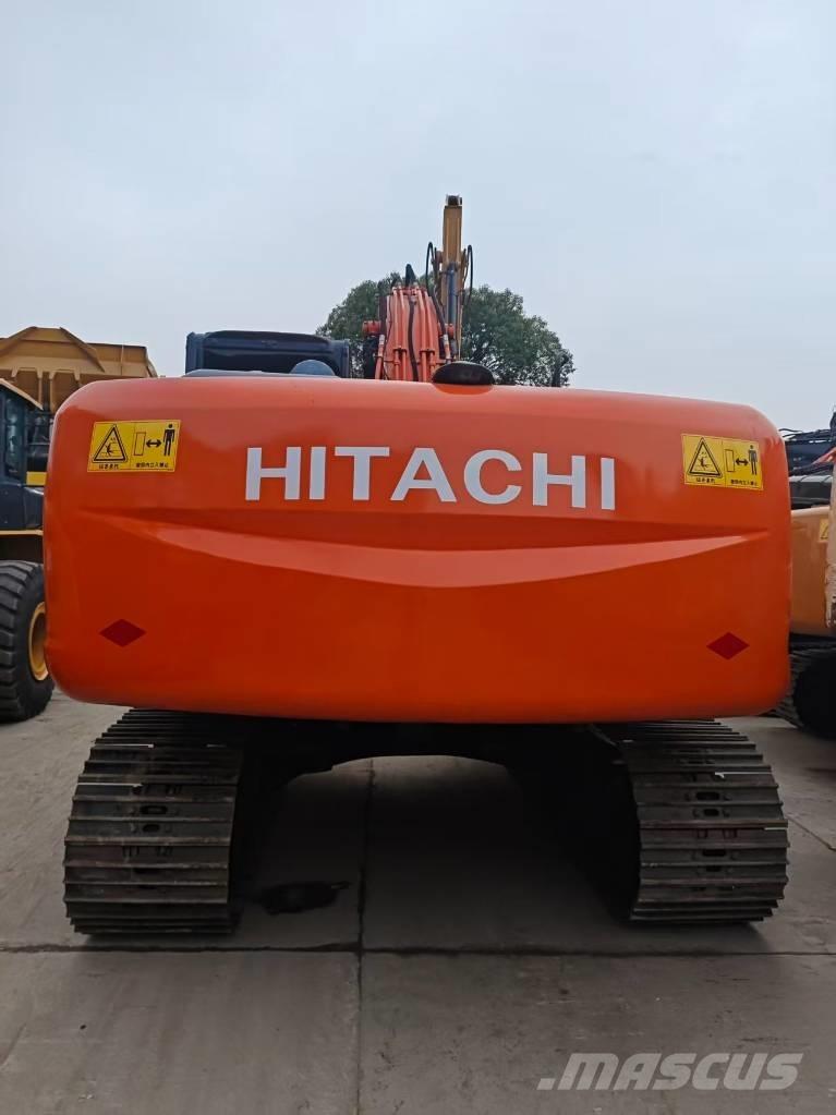 Hitachi ZX 210 Гусеничні екскаватори