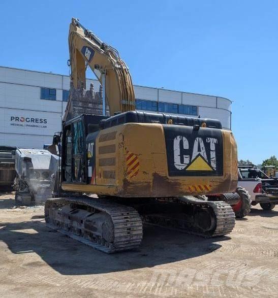 CAT 330 Гусеничні екскаватори