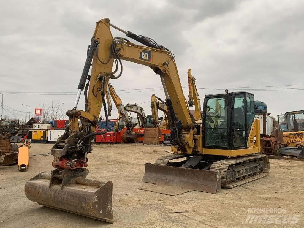 CAT 308 CR Середні екскаватори 7т. - 12т.