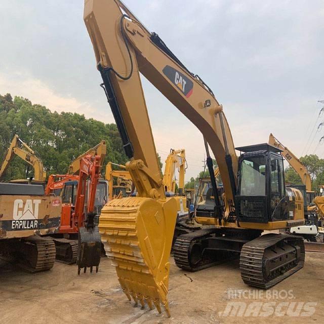 CAT 330DL Гусеничні екскаватори