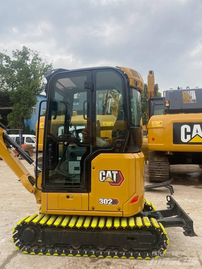 CAT 302 Міні-екскаватори < 7т