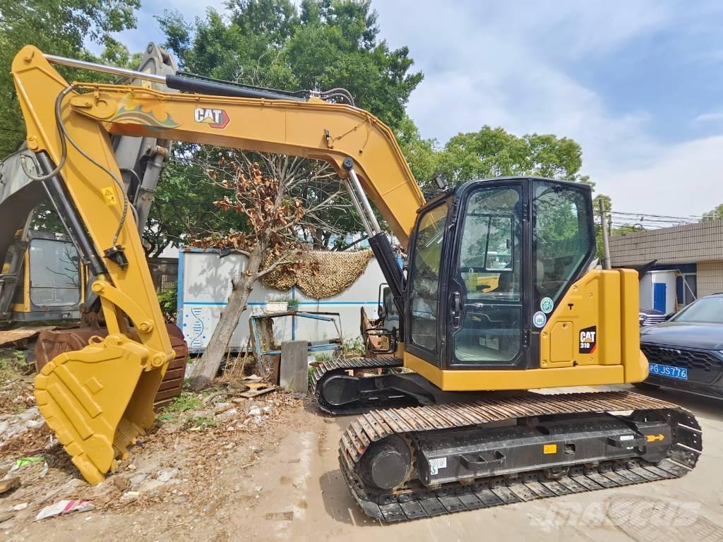 CAT 310 Гусеничні екскаватори