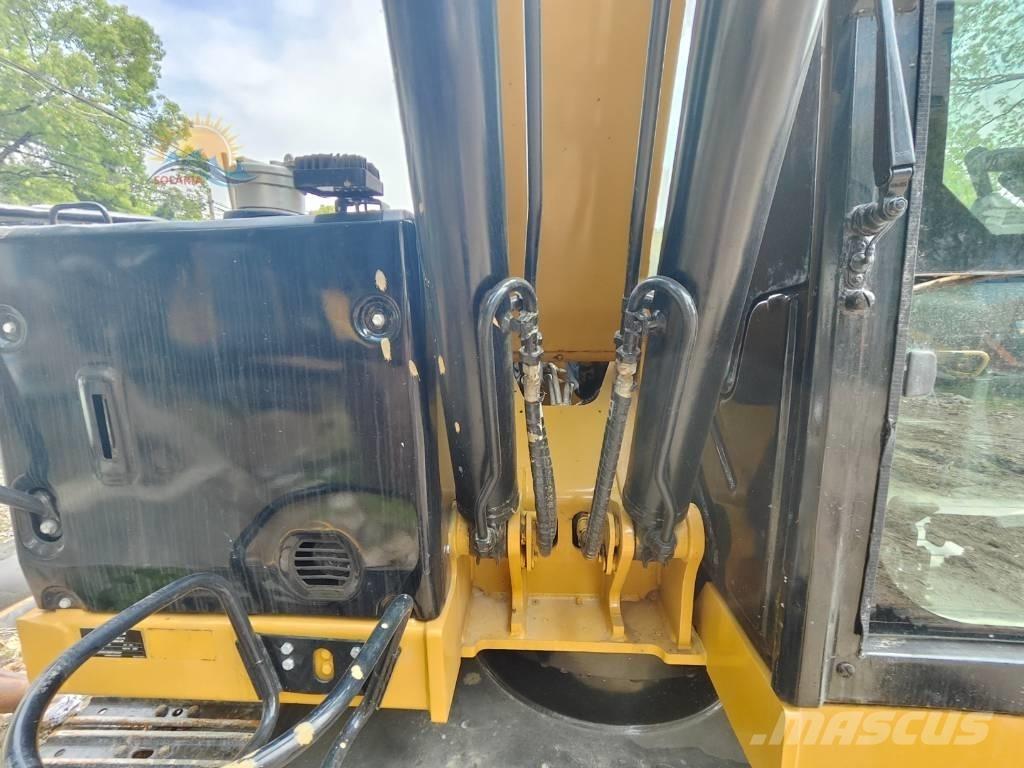 CAT 310 Гусеничні екскаватори