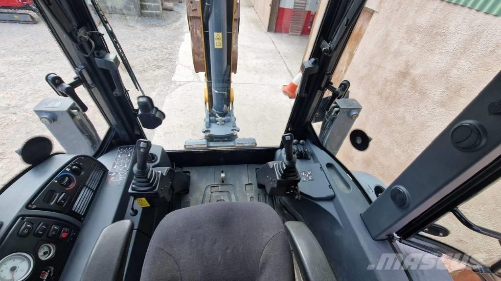 Terex TLB 890 Екскаватори-навантажувачі