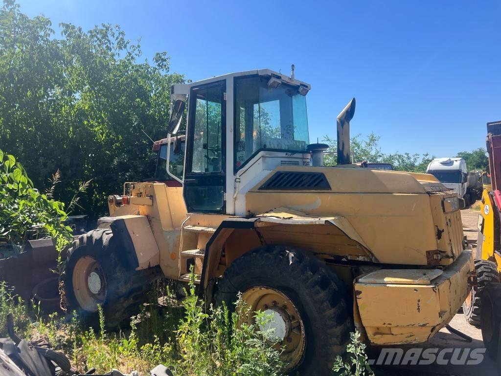Liebherr 522 Бони і ковші