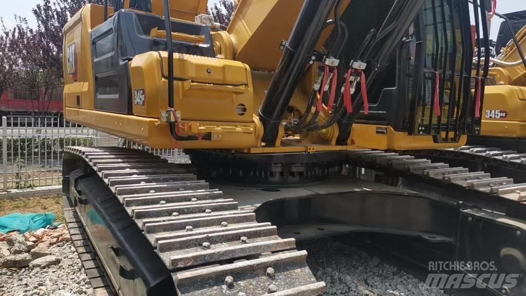CAT 345 Гусеничні екскаватори
