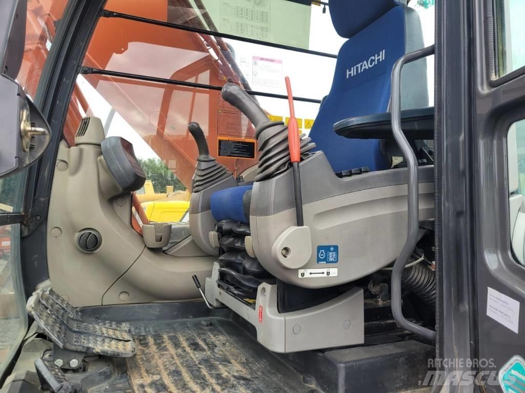 Hitachi 180 Гусеничні екскаватори