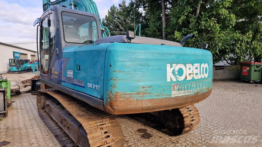 Kobelco SK210 Гусеничні екскаватори