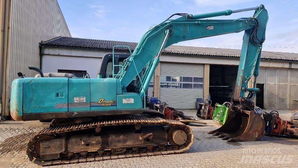 Kobelco SK210 Гусеничні екскаватори