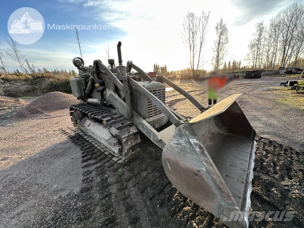 CAT 955 Гусеничні вантажники