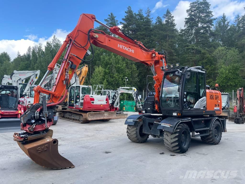 Hitachi 140W Колісні екскаватори