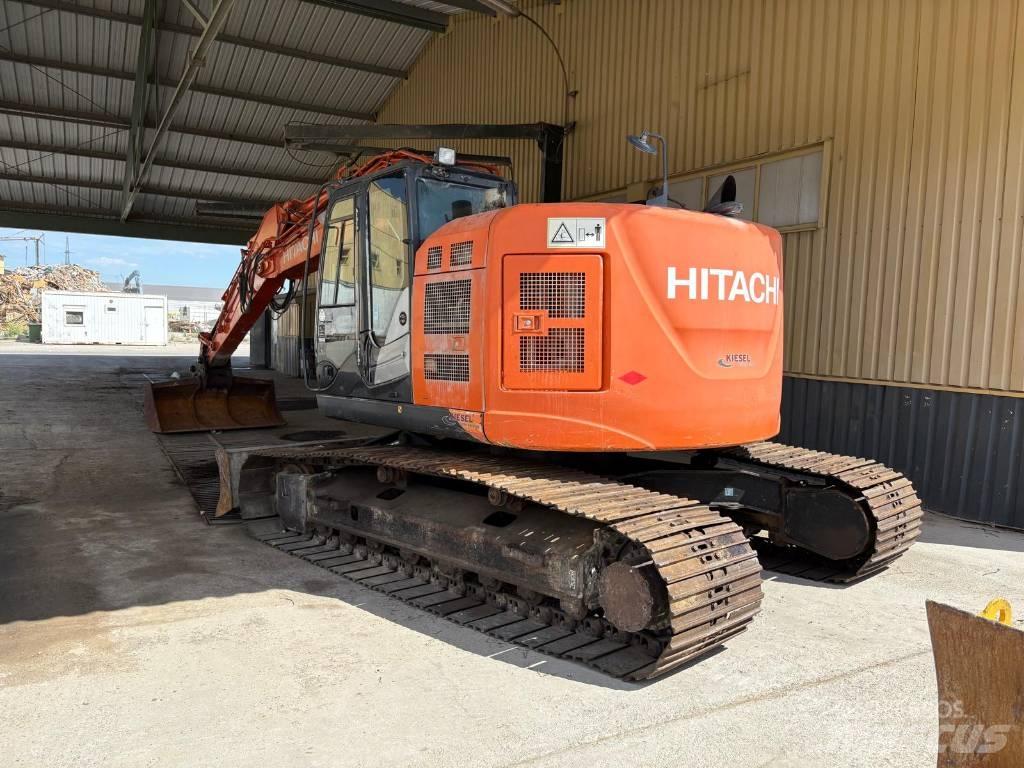 Hitachi ZX 225 Гусеничні екскаватори
