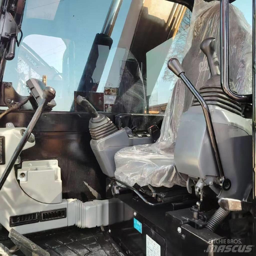 CAT 308 Гусеничні екскаватори