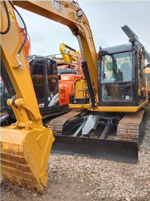 CAT 308 E Гусеничні екскаватори