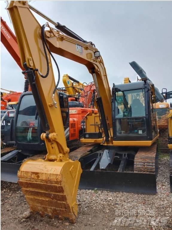 CAT 308 E Гусеничні екскаватори
