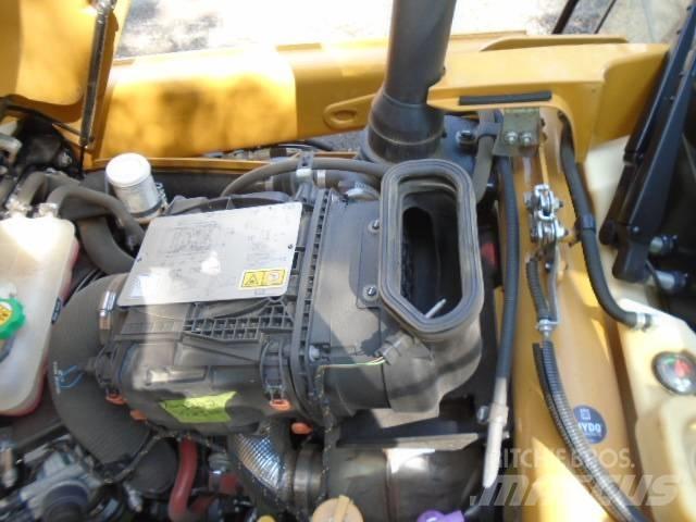 CAT 420XE Екскаватори-навантажувачі