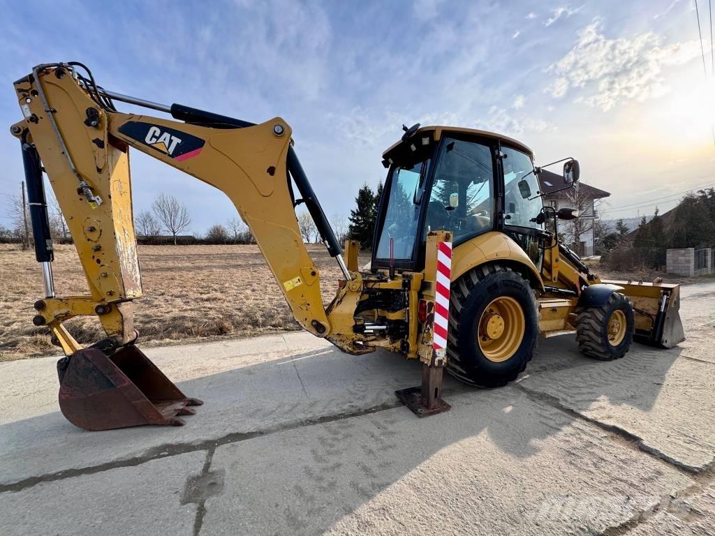 CAT 428 E Екскаватори-навантажувачі