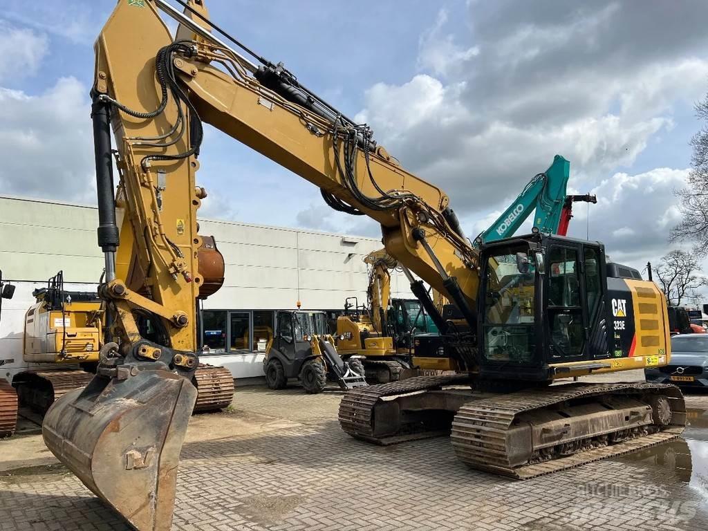 CAT 323E Гусеничні екскаватори