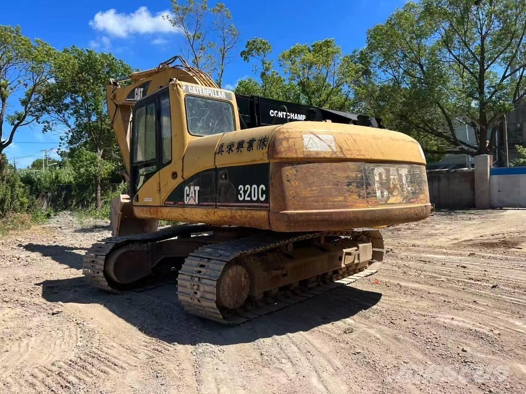 CAT 320 C Гусеничні екскаватори