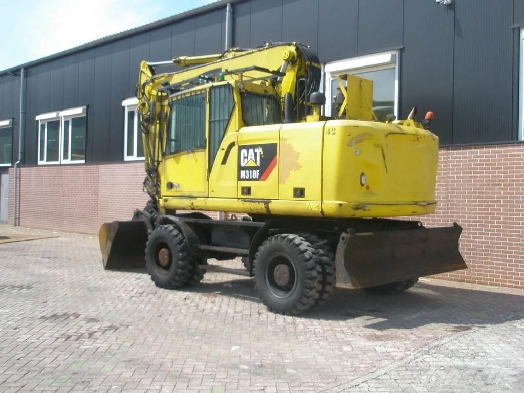 CAT M318F Колісні екскаватори