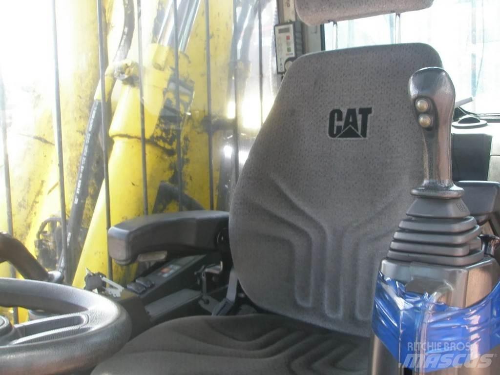 CAT M318F Колісні екскаватори