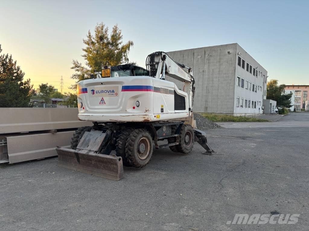 CAT m314f Колісні екскаватори