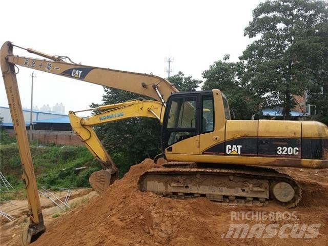 CAT 320 C Екскаватори з великим вилітом