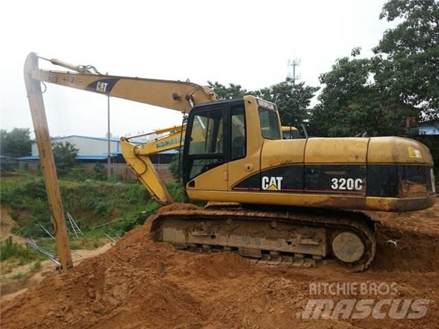 CAT 320 C Екскаватори з великим вилітом