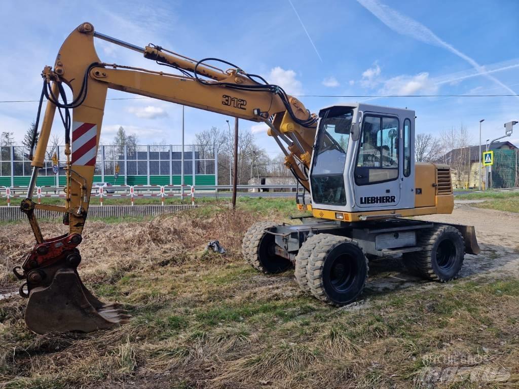 Liebherr 312 A Колісні екскаватори