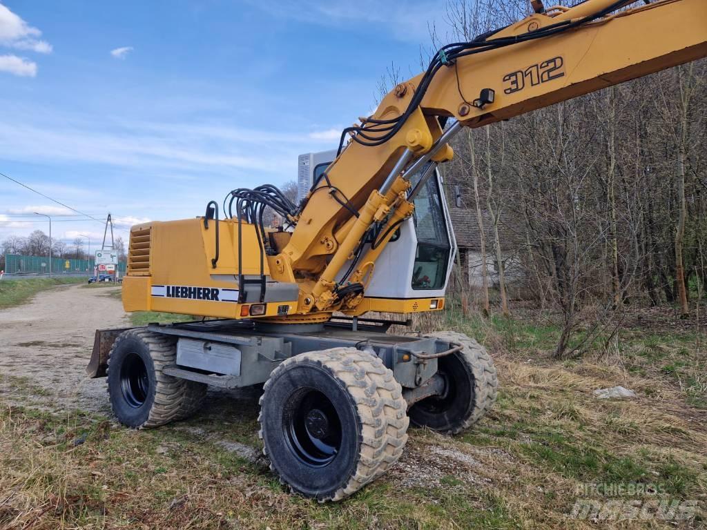 Liebherr 312 A Колісні екскаватори