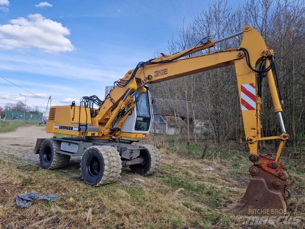 Liebherr 312 A Колісні екскаватори