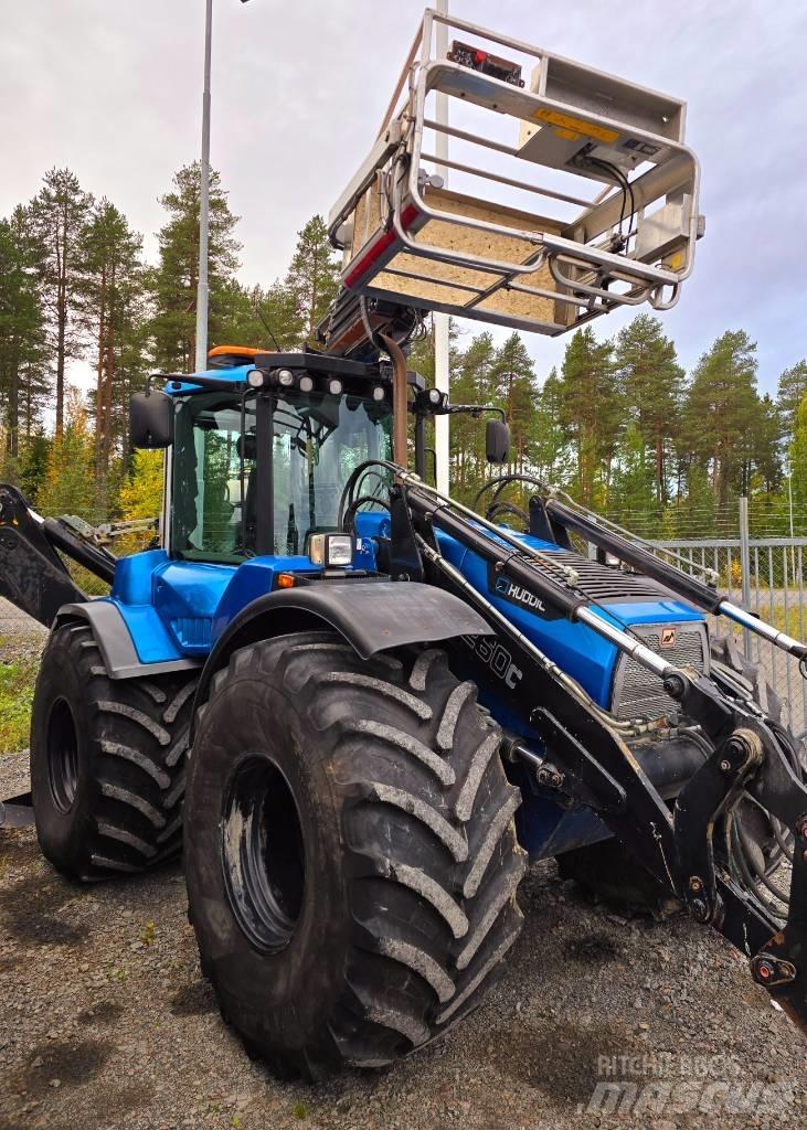 Huddig 1260 C Екскаватори-навантажувачі