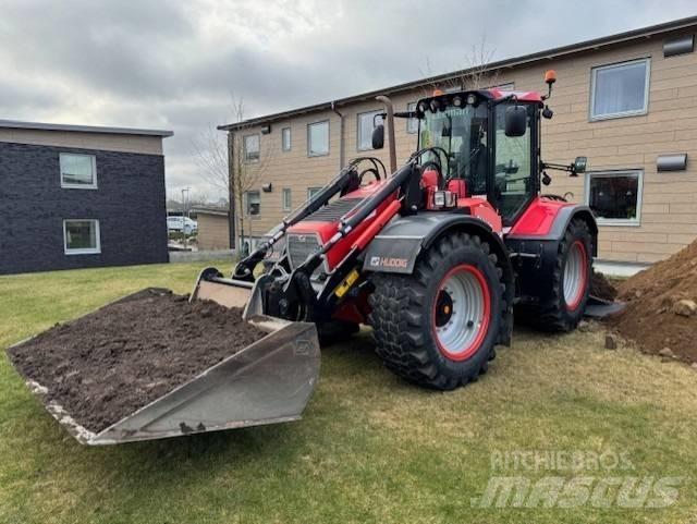 Huddig 1260 C Екскаватори-навантажувачі