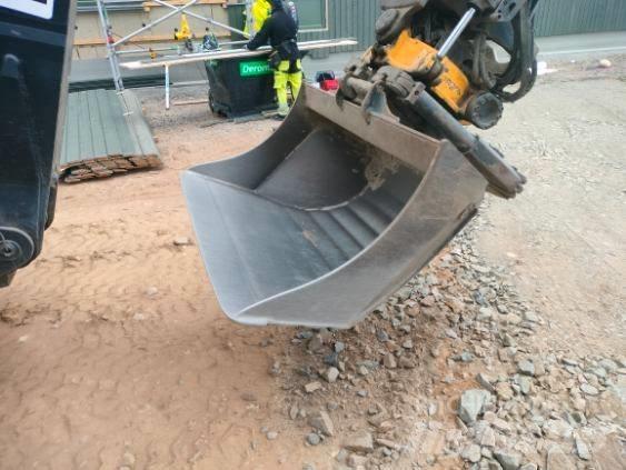 Huddig 1260 C Екскаватори-навантажувачі