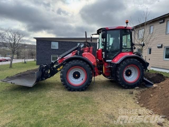 Huddig 1260 C Екскаватори-навантажувачі