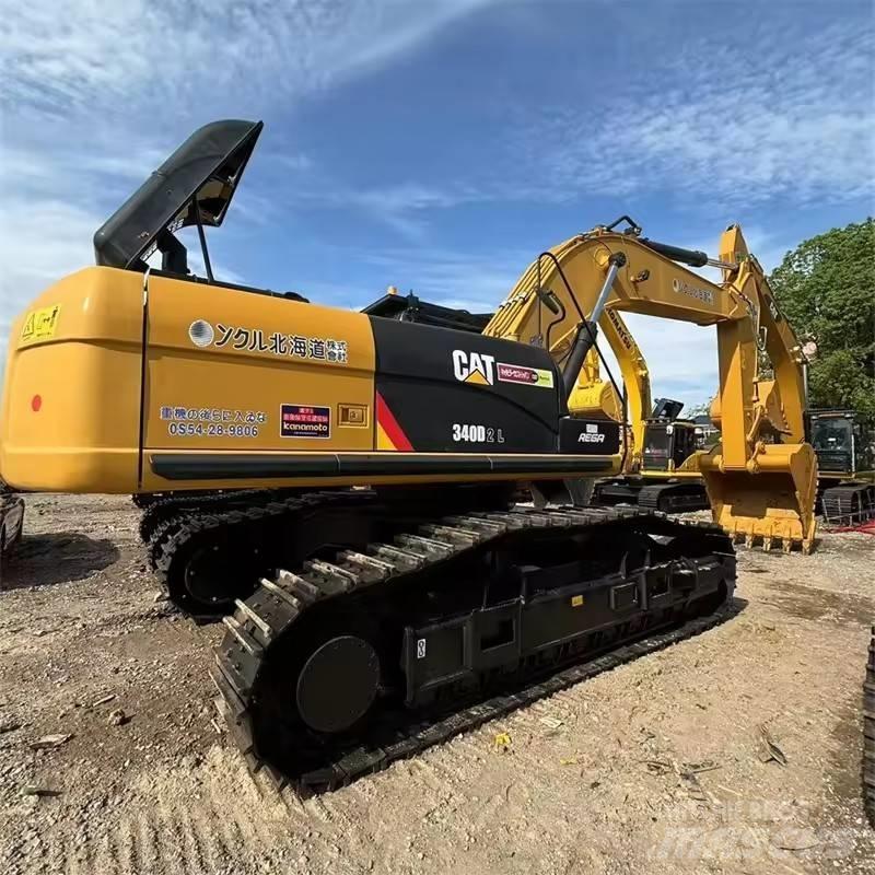 CAT 340 Гусеничні екскаватори