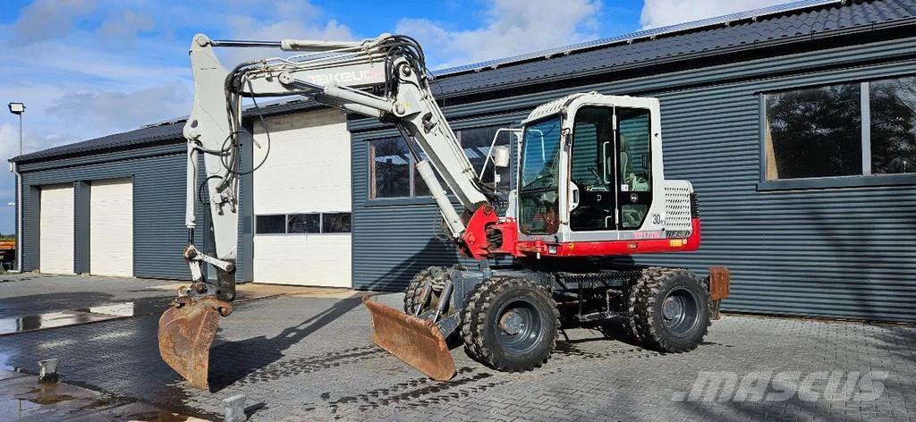 Takeuchi TB 175W Середні екскаватори 7т. - 12т.