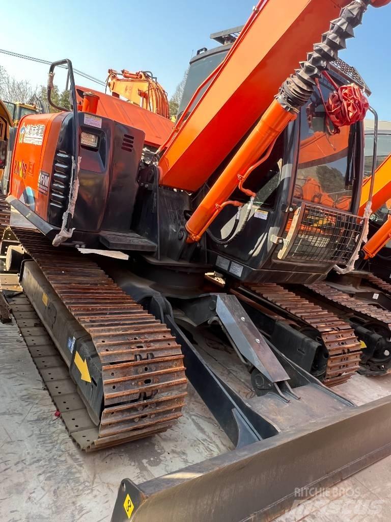 Hitachi ZX70 Середні екскаватори 7т. - 12т.