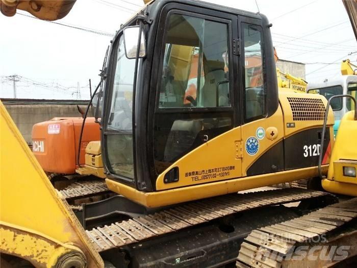 CAT 312 D Гусеничні екскаватори