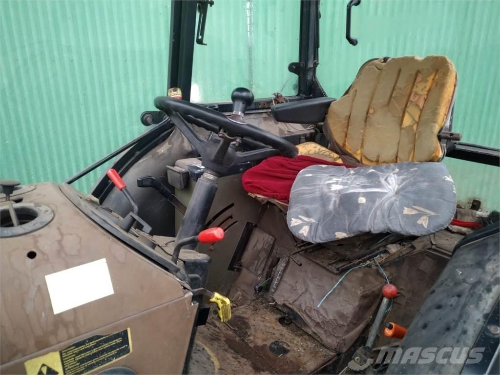 John Deere 1850 Трактори
