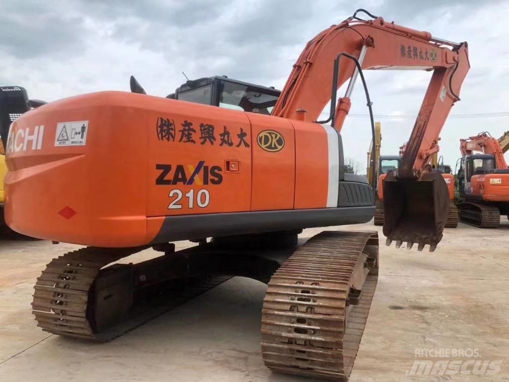 Hitachi ZX 210 Гусеничні екскаватори