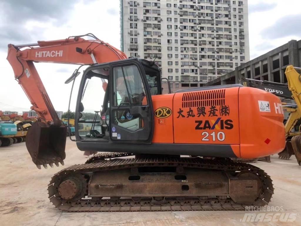 Hitachi ZX 210 Гусеничні екскаватори