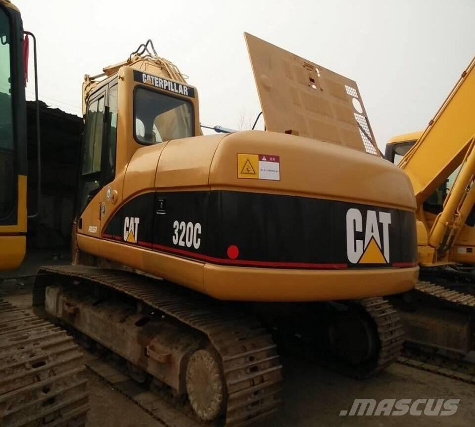 CAT 320 C Гусеничні екскаватори