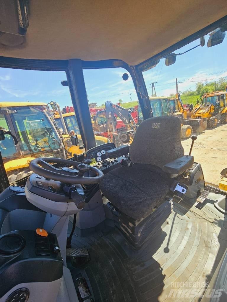CAT 428 E Екскаватори-навантажувачі
