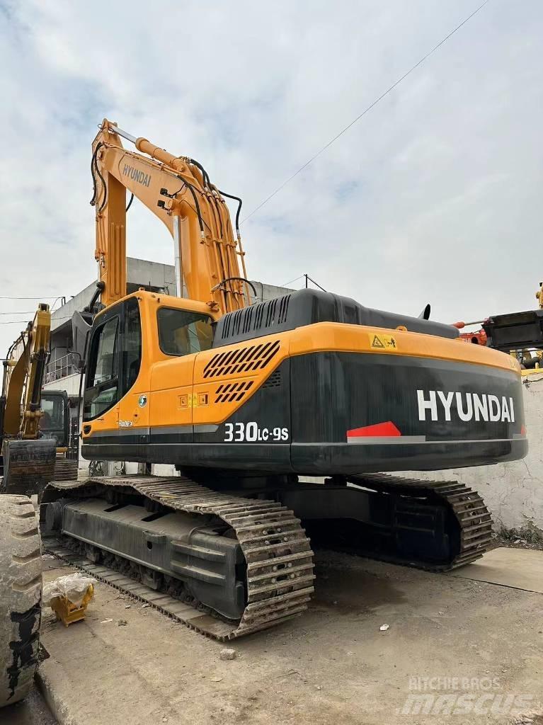 Hyundai 330LC-9T Гусеничні екскаватори