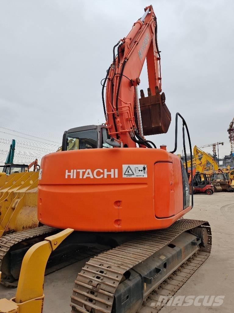 Hitachi ZX 135 US Гусеничні екскаватори
