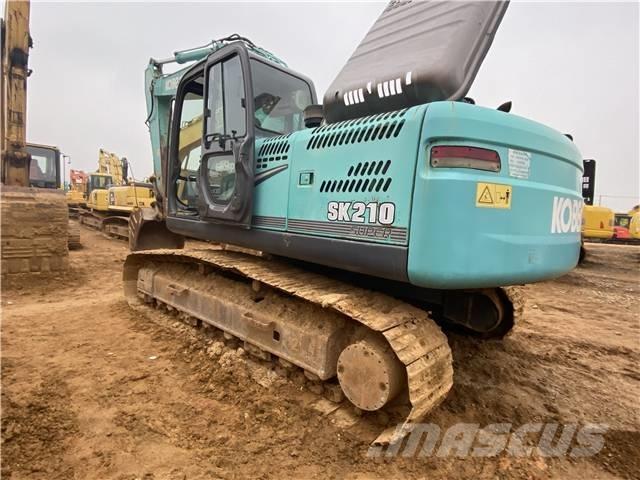 Kobelco SK 210 Гусеничні екскаватори